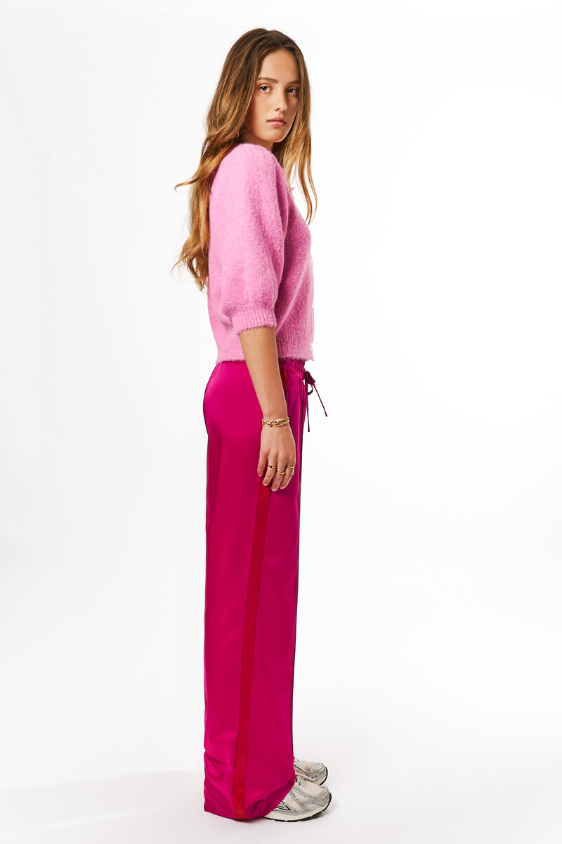 Pink wide leg trousers with red side stripe | My Jewellery