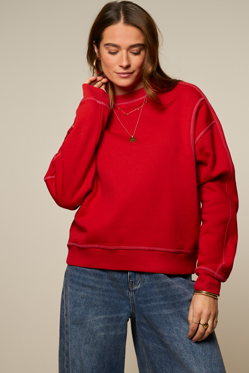 Red sweater with contrast stitching | My Jewellery