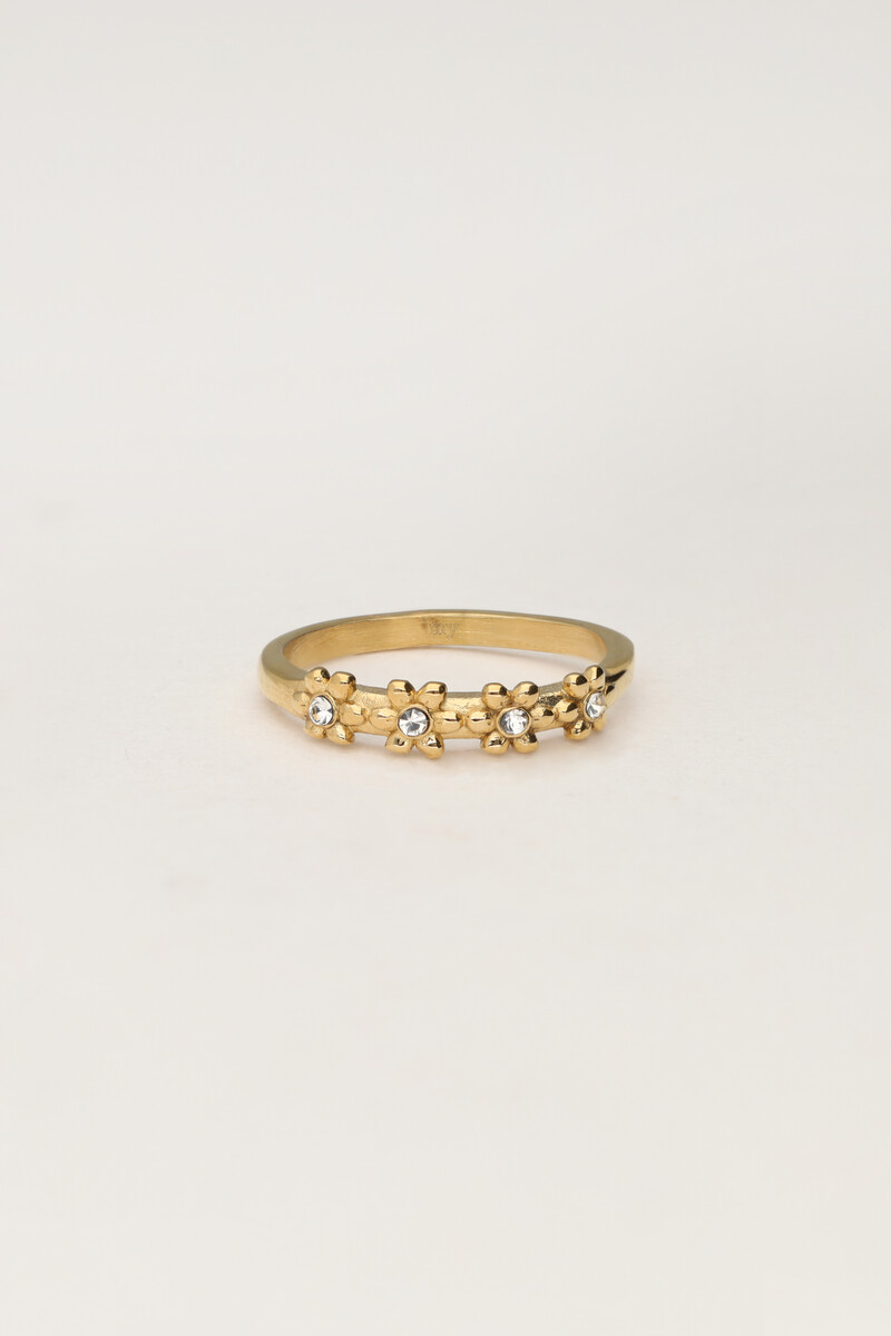 Bague avec fleurs et pierres