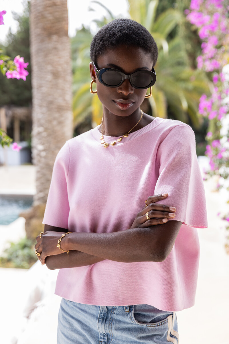 Light pink top with short sleeves & bows | My Jewellery