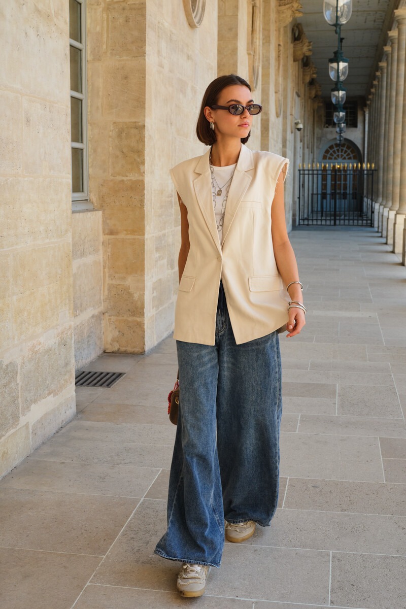 Veston sans manches blanc avec coutures