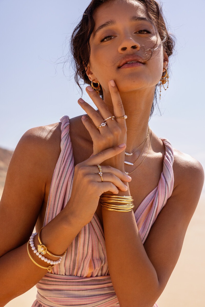 Stretch ring met imitatieparel bloem