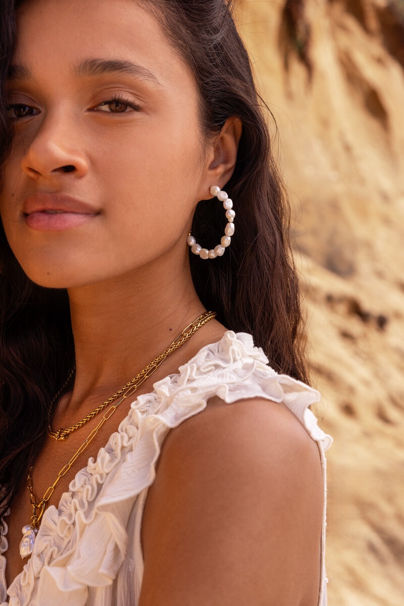Statement hoop earrings with natural pearls
