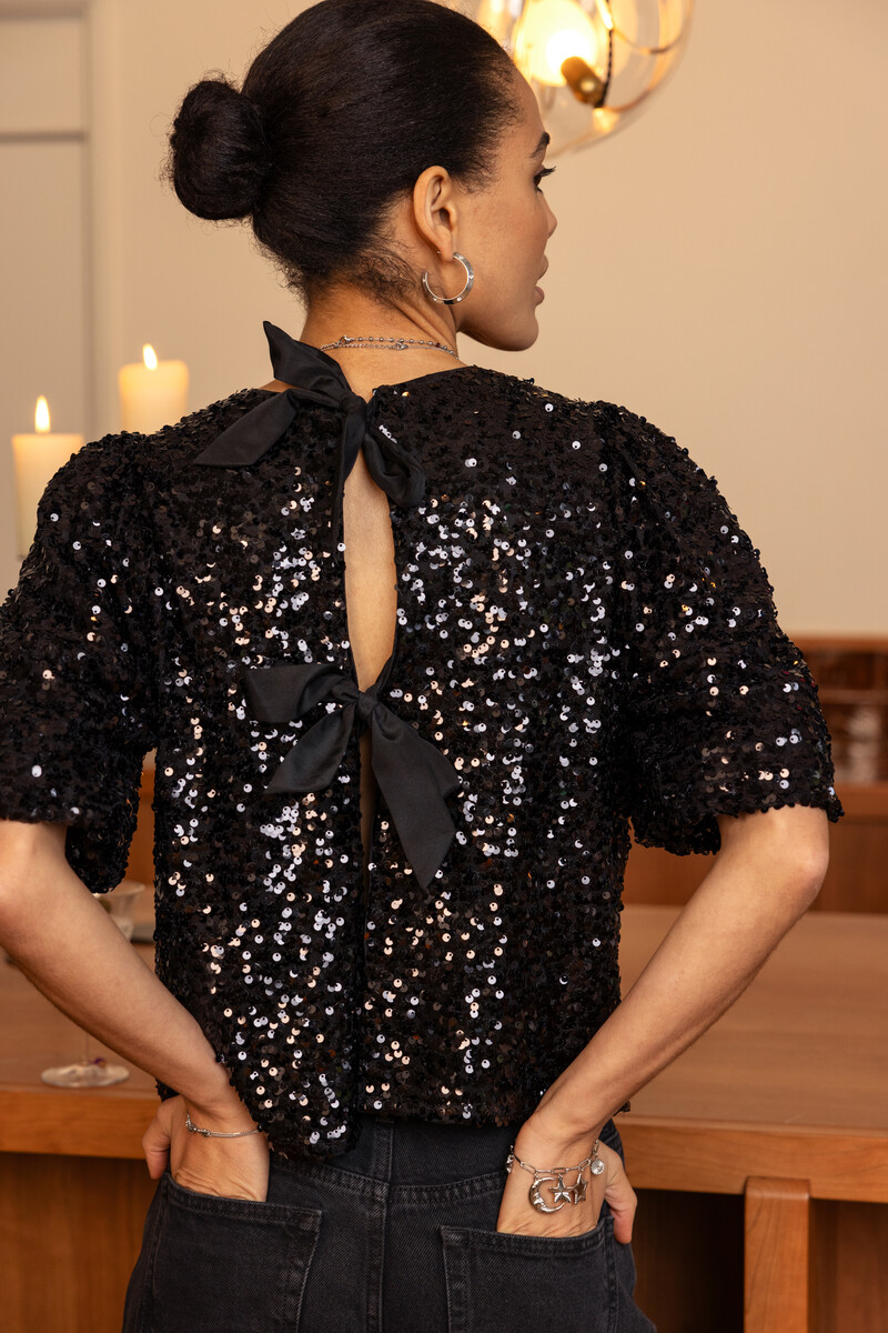 Black sequin top with bows | My Jewellery