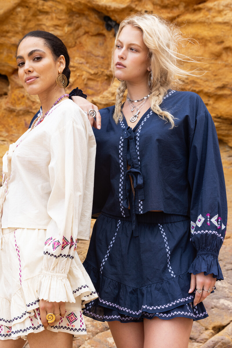 Blue top with bows & embroidery details | My Jewellery