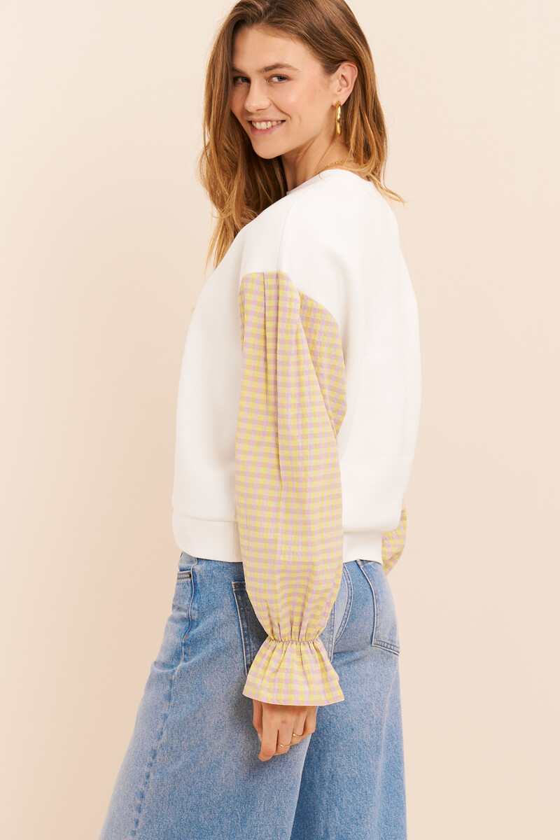 White sweater with yellow checkered sleeves | My Jewellery