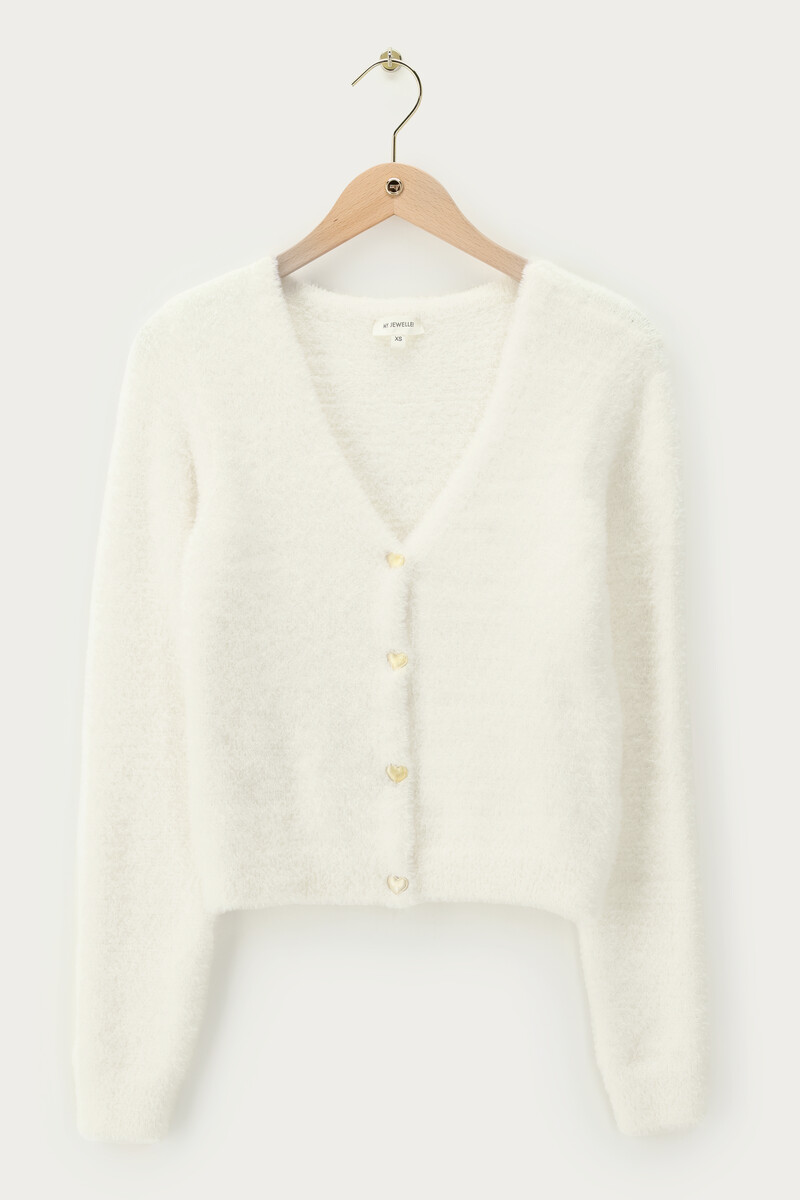 White cardigan with gold-coloured heart buttons | My Jewellery