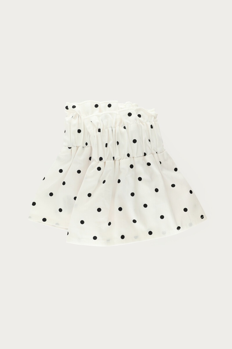 White cuffs with black polka dots | My Jewellery