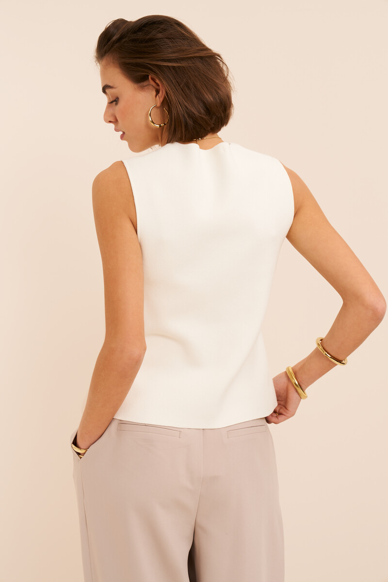 White gilet with button details | My Jewellery