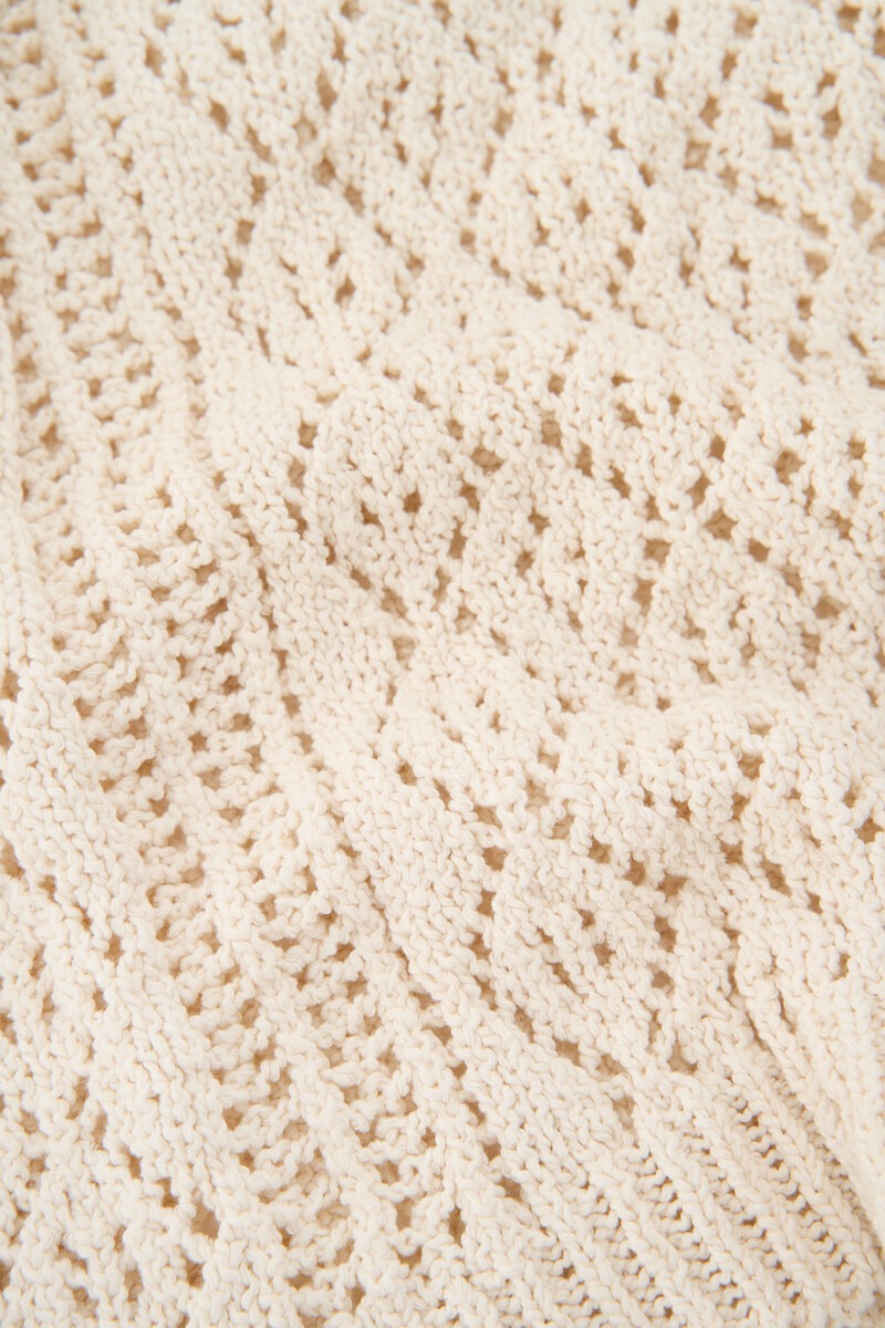 White knitted top with short sleeves and ajour | My Jewellery