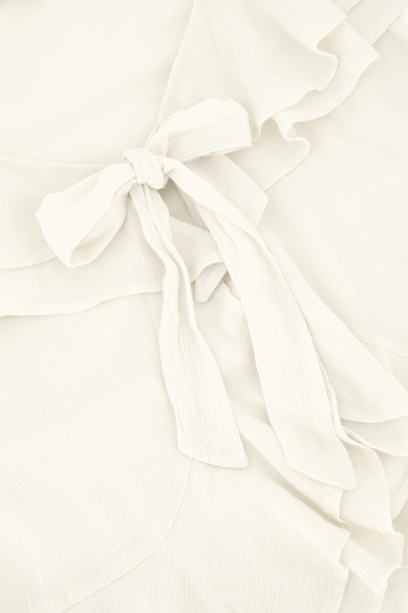White ruffle top with bow | My Jewellery