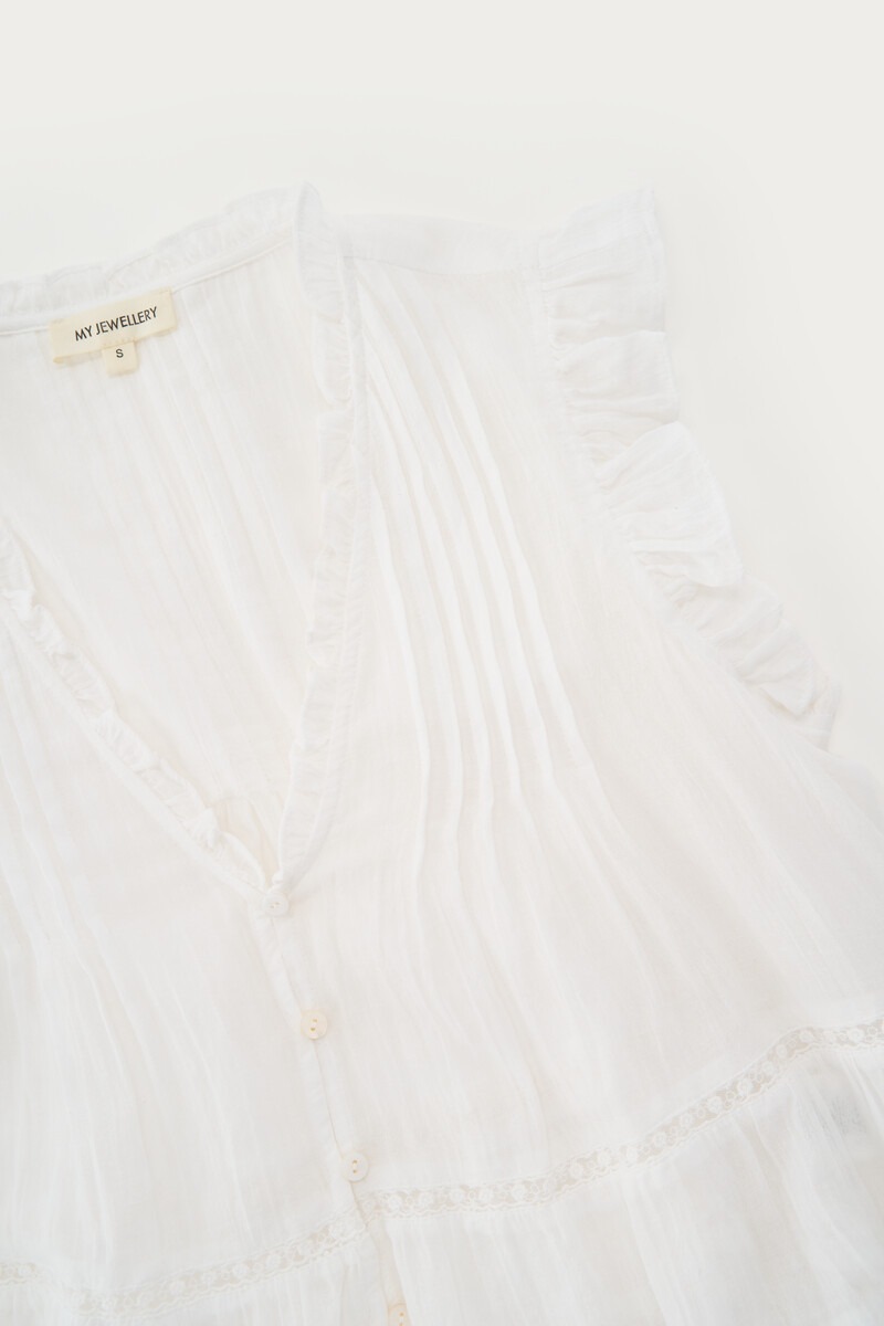 White sleeveless top with ruffles and a V-neck | My Jewellery