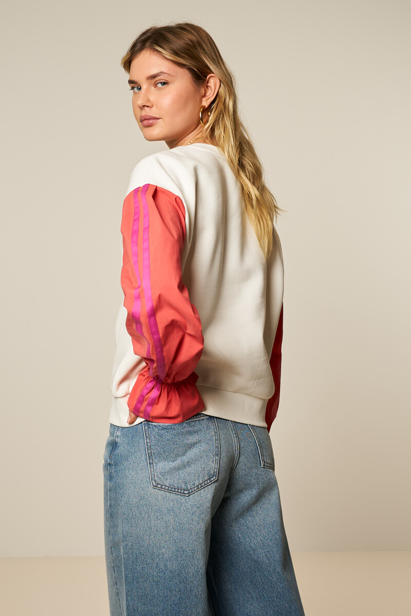 White sweater with coral contrast sleeves | My Jewellery