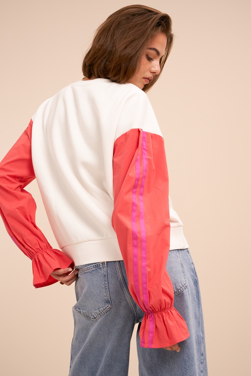 White sweater with coral contrast sleeves | My Jewellery