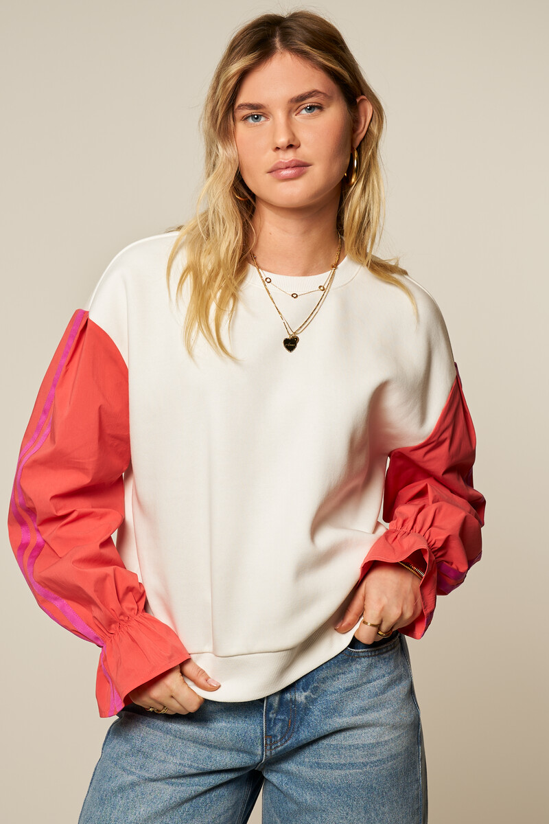 White sweater with coral contrast sleeves | My Jewellery