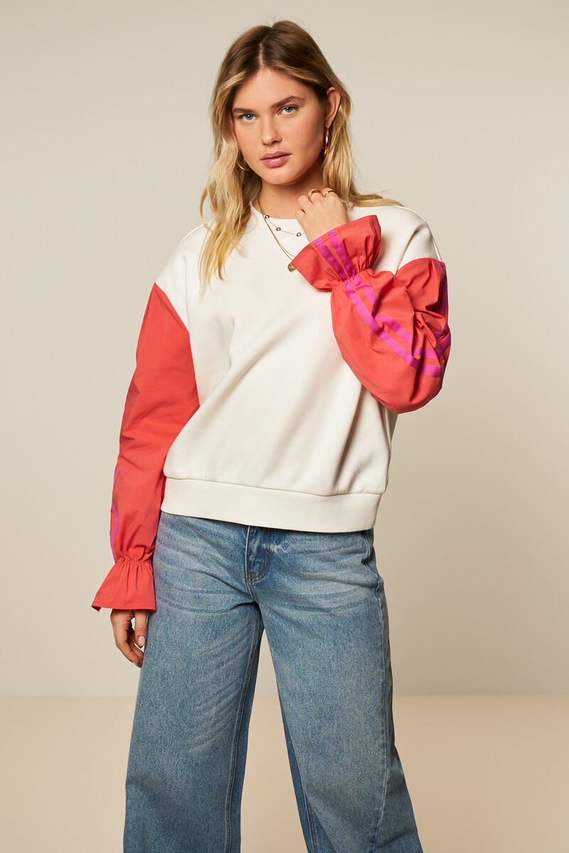 White sweater with coral contrast sleeves | My Jewellery