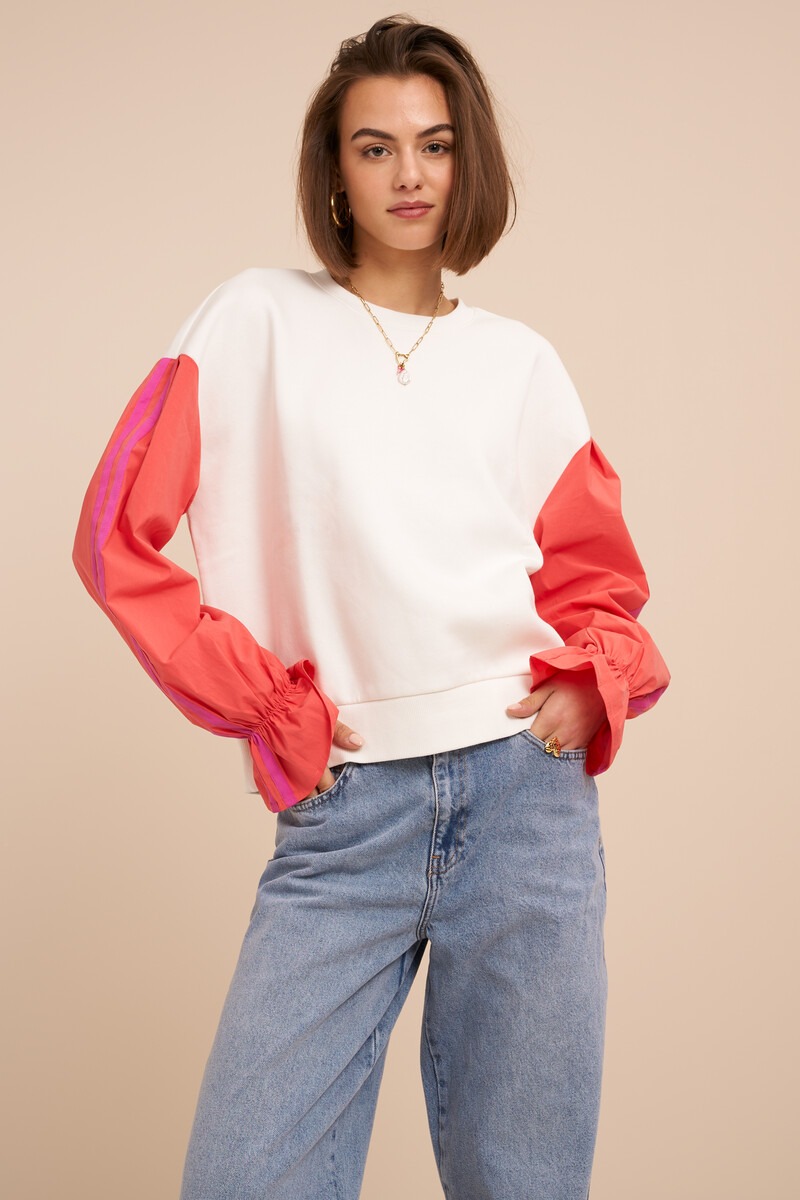 White sweater with coral contrast sleeves | My Jewellery