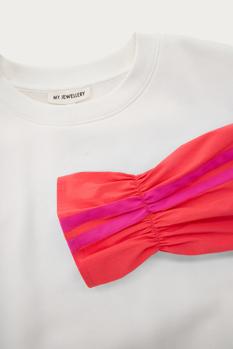 White sweater with coral contrast sleeves | My Jewellery