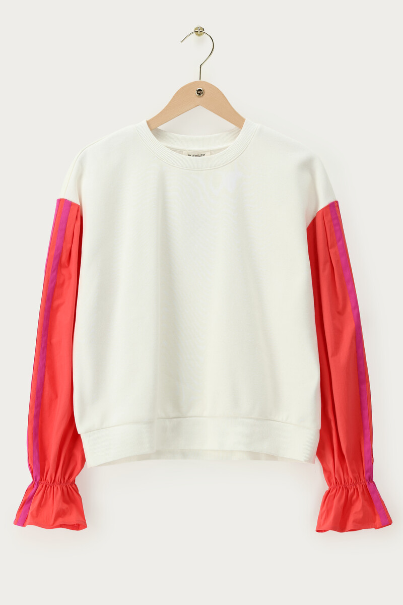 White sweater with coral contrast sleeves | My Jewellery