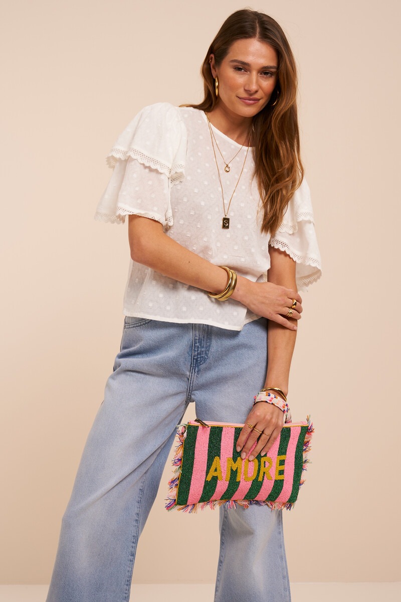 White top with short sleeves and double ruffles