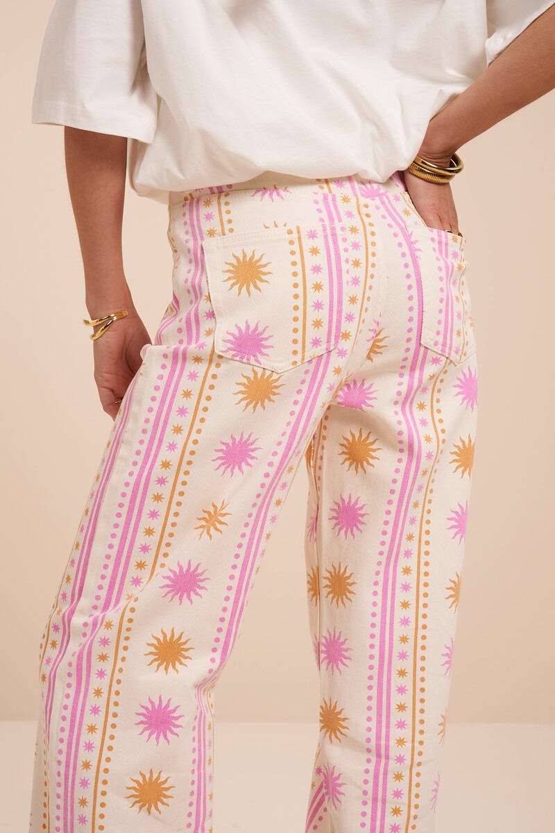 Jean large blanc imprimé soleil