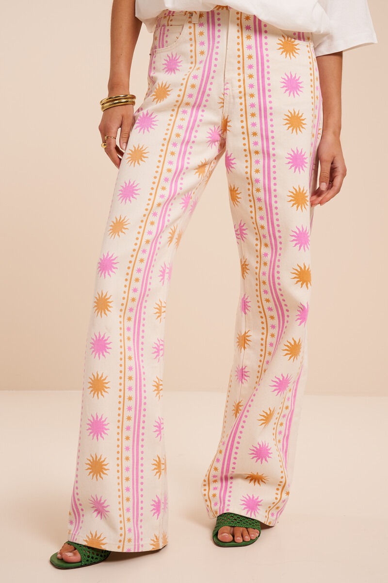 White wide-leg jeans with a sun print | My Jewellery