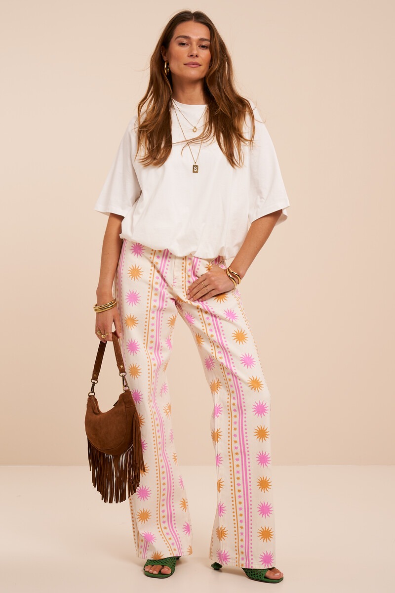 Jean large blanc imprimé soleil