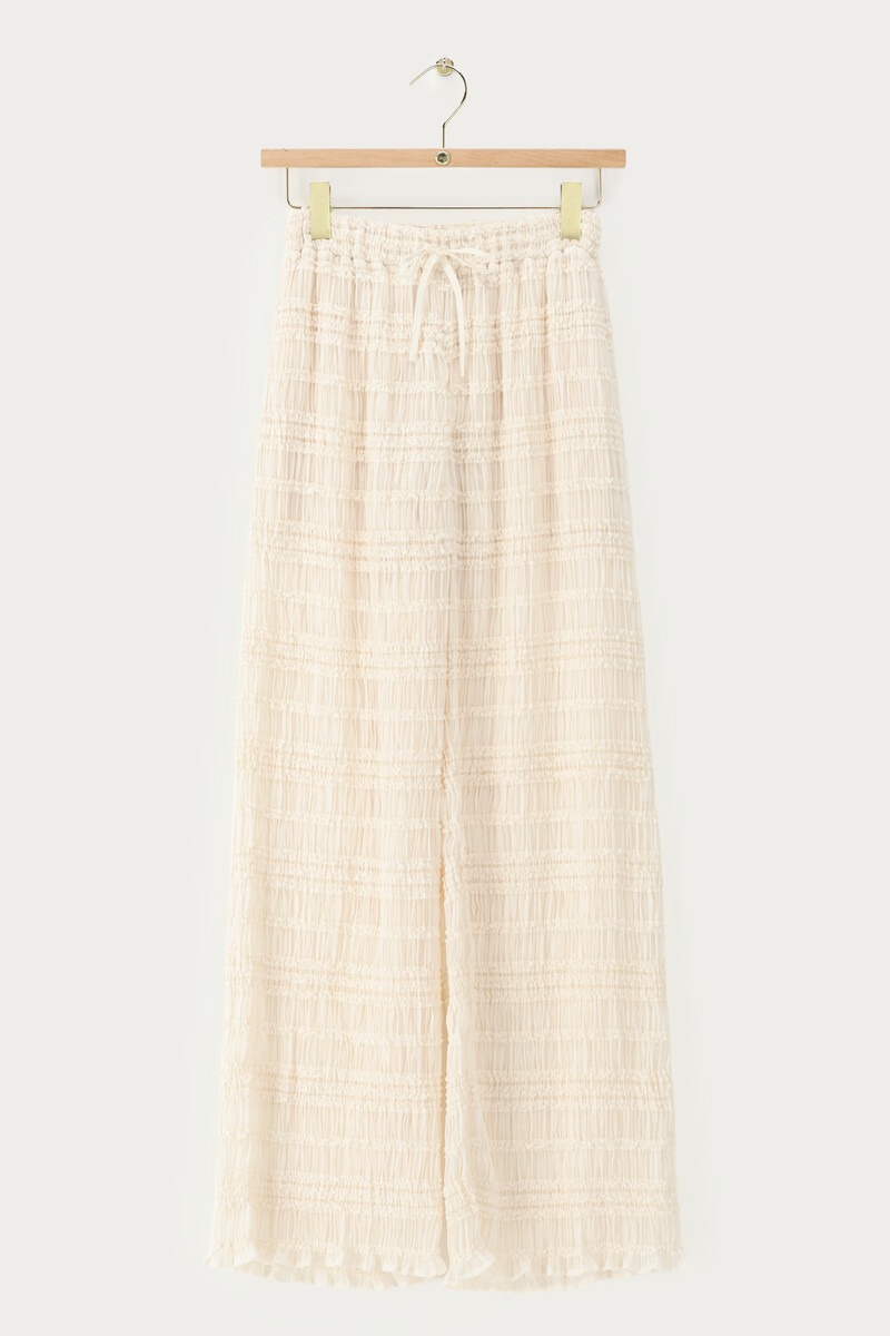 White wide leg trousers with ruflles | My Jewellery