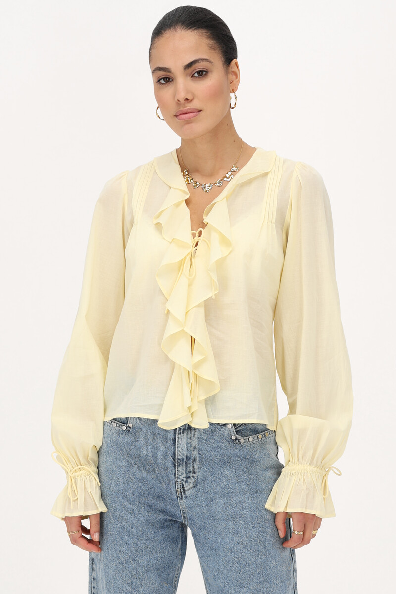 Yellow blouse with ruffles and bows