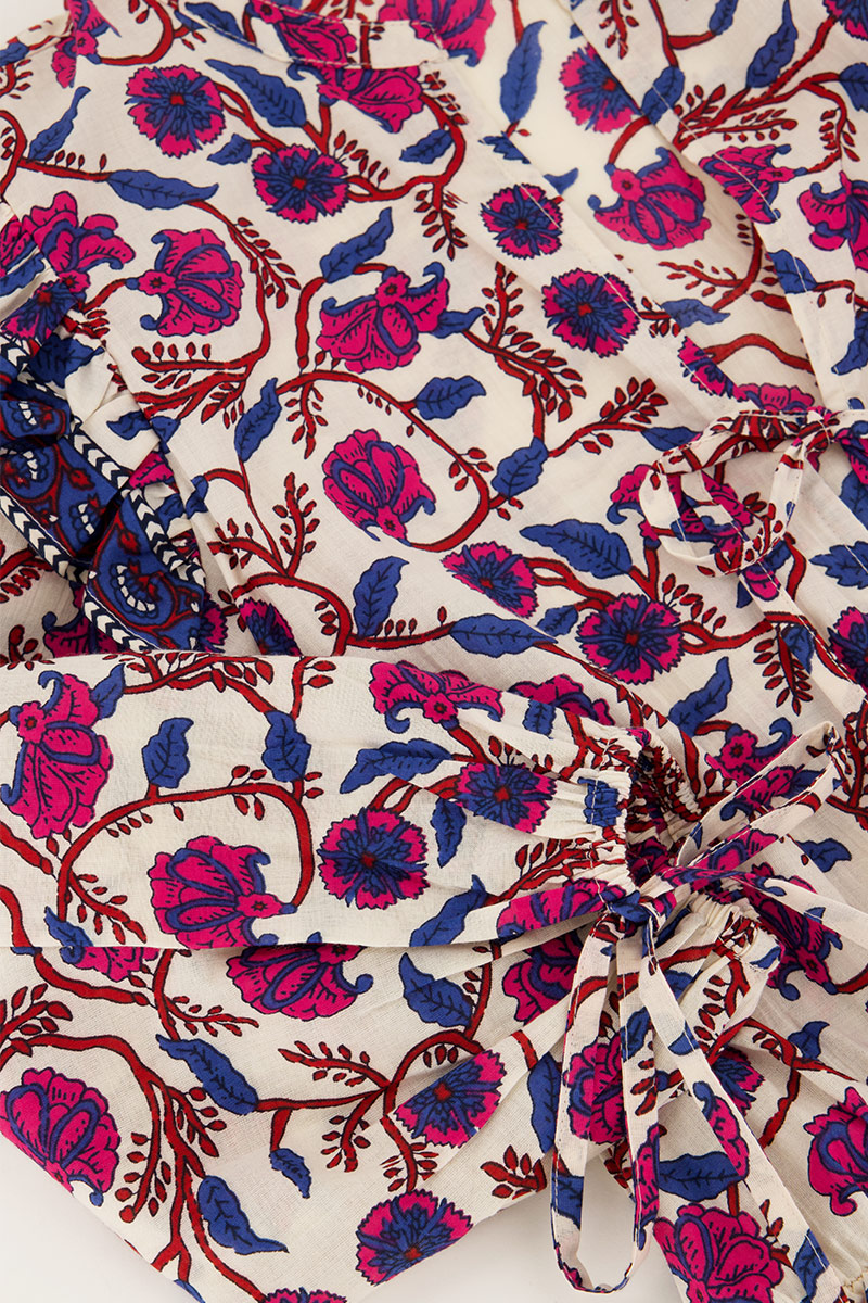 White dress with floral print & ruffles | My Jewellery