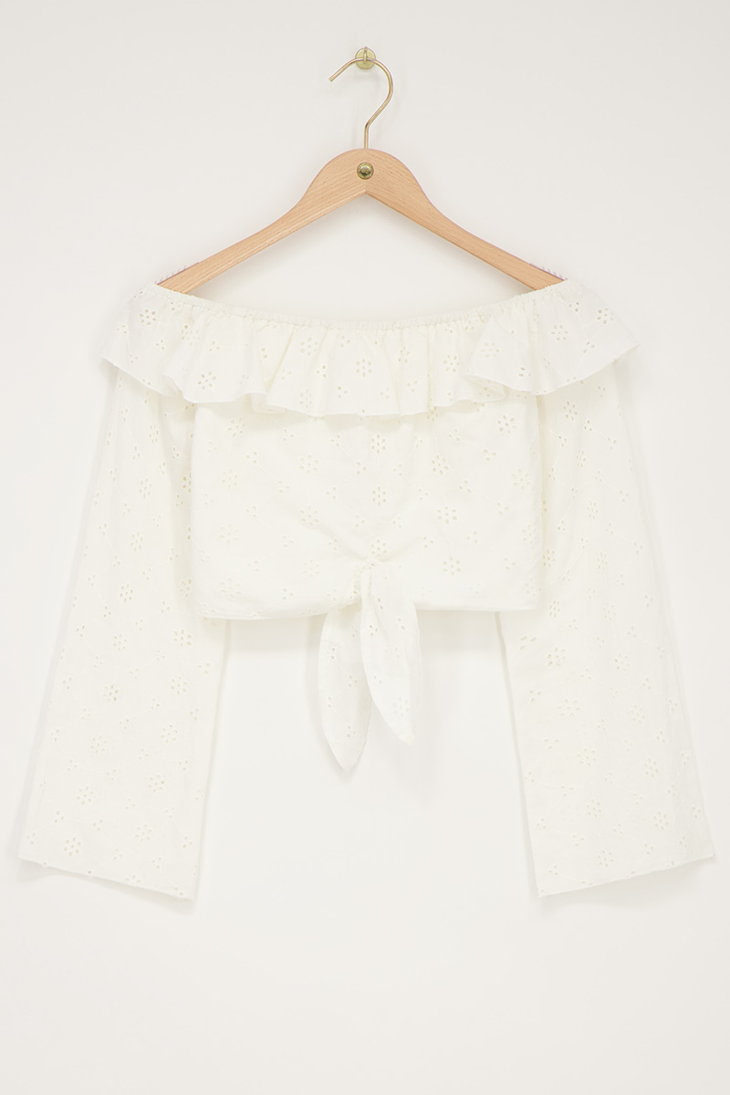 White off-shoulder top with embroidery and bow detail