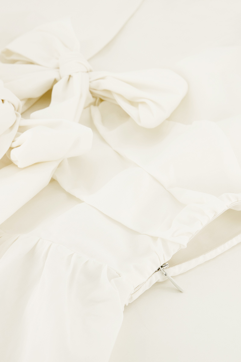 White top with bows & peplum | My Jewellery