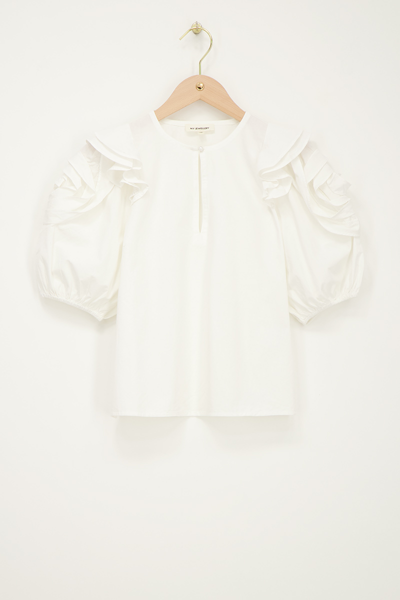 White top with flowers on sleeves