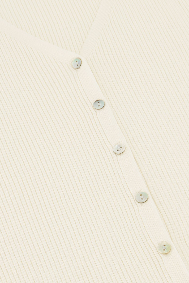 White gilet with buttons | My Jewellery